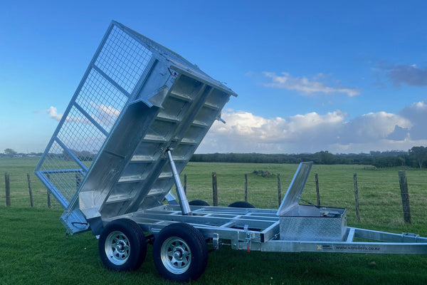 Side view of galvanised trailer frame and axle assembly